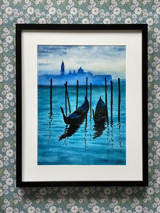 Framed Venice Gondola Watercolor Poster displayed against floral wallpaper